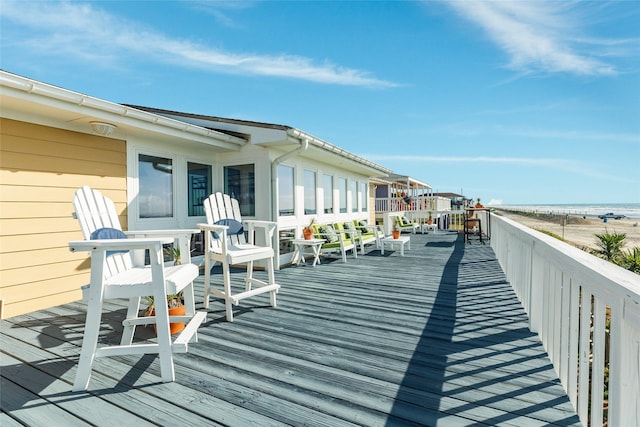 deck featuring a water view