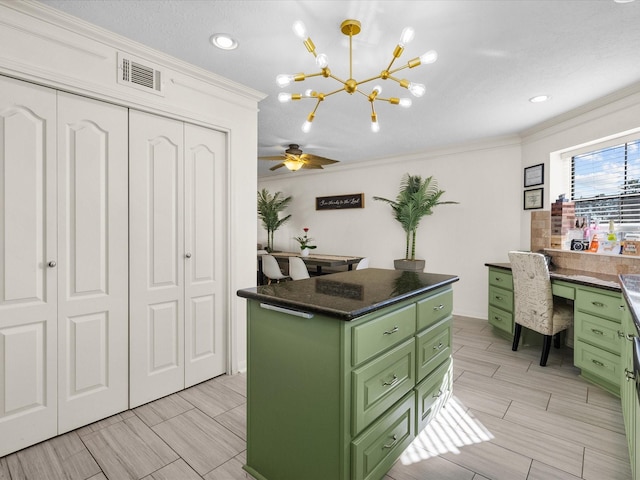 office featuring ceiling fan and ornamental molding