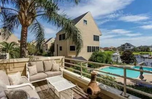 balcony featuring an outdoor living space