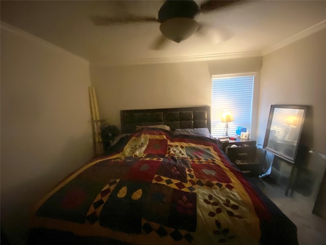 carpeted bedroom featuring crown molding and ceiling fan