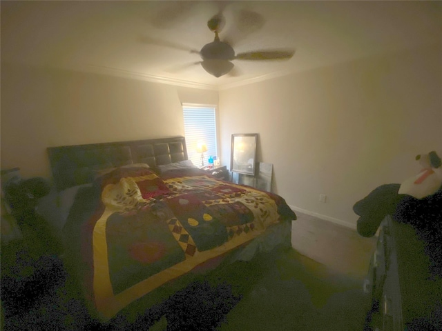 bedroom with ceiling fan, ornamental molding, and carpet floors