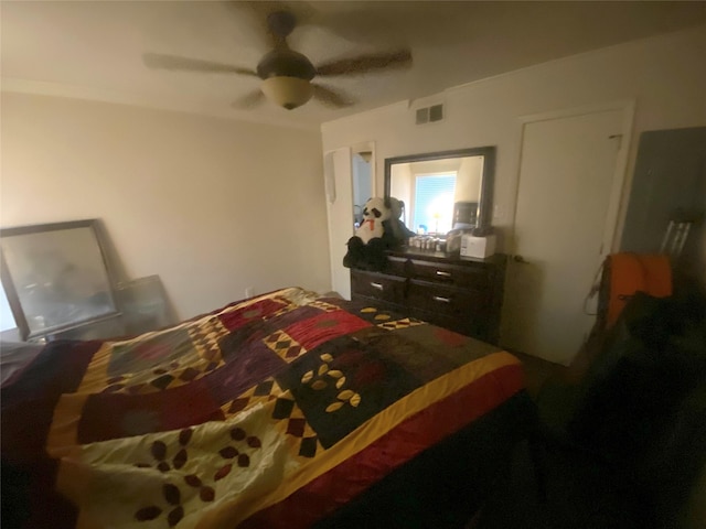 bedroom featuring ceiling fan