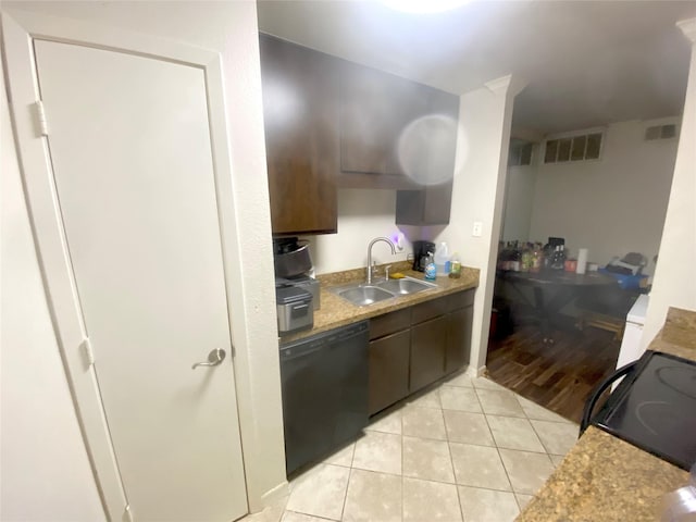 kitchen with dark brown cabinetry, sink, electric range oven, light tile patterned floors, and black dishwasher