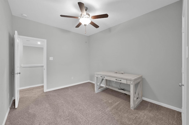 interior space featuring carpet flooring and ceiling fan