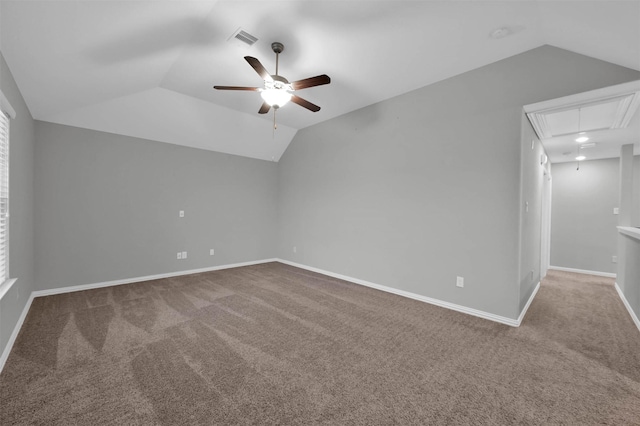 bonus room with lofted ceiling, carpet flooring, and ceiling fan