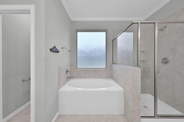 bathroom featuring crown molding, shower with separate bathtub, and tile patterned floors