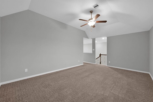 interior space featuring lofted ceiling and ceiling fan