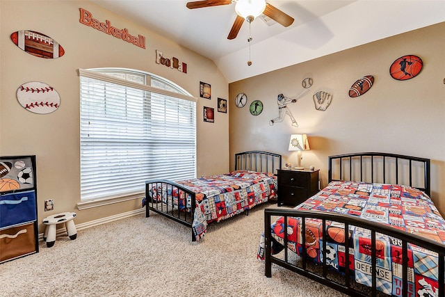 bedroom with vaulted ceiling, carpet, and ceiling fan