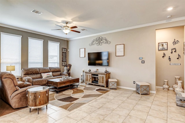 living room with crown molding, ceiling fan, and light tile patterned floors