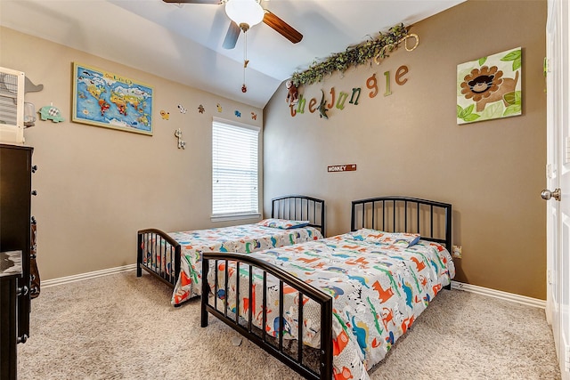 carpeted bedroom featuring ceiling fan and lofted ceiling