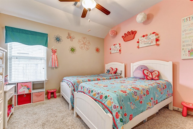 bedroom with lofted ceiling, carpet floors, and ceiling fan