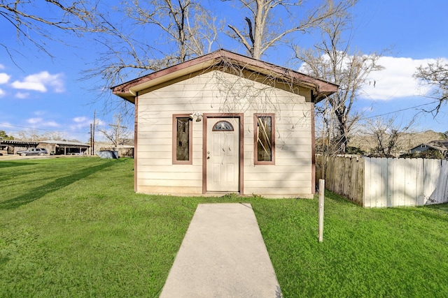 view of outdoor structure with a yard