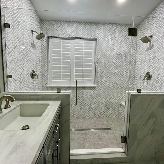 bathroom with vanity and an enclosed shower