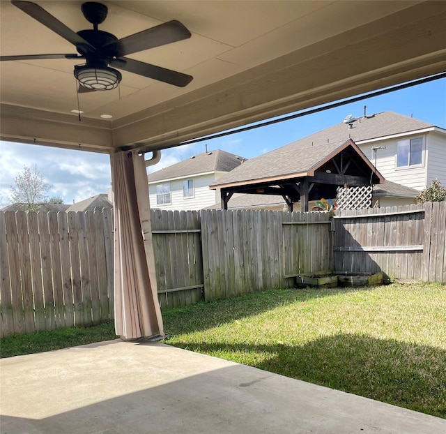 view of patio with ceiling fan