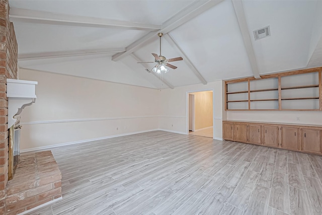 unfurnished living room with ceiling fan, lofted ceiling with beams, and light hardwood / wood-style flooring