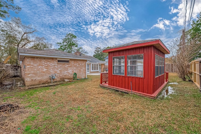 view of yard with an outdoor structure