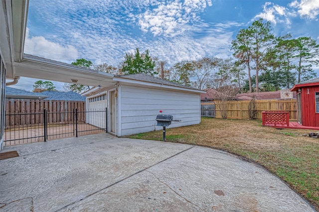 view of patio featuring a garage