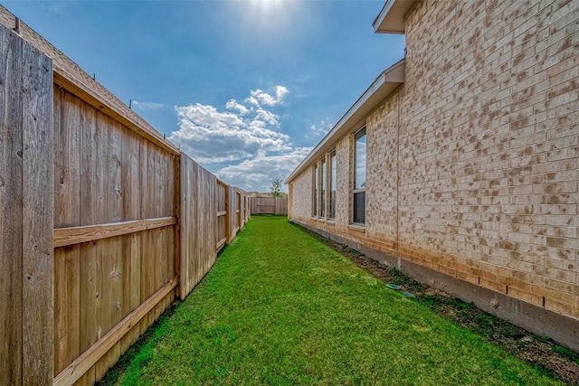 view of yard featuring a fenced backyard