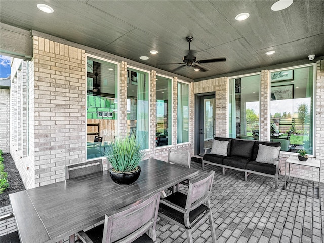 view of patio / terrace with outdoor lounge area and ceiling fan