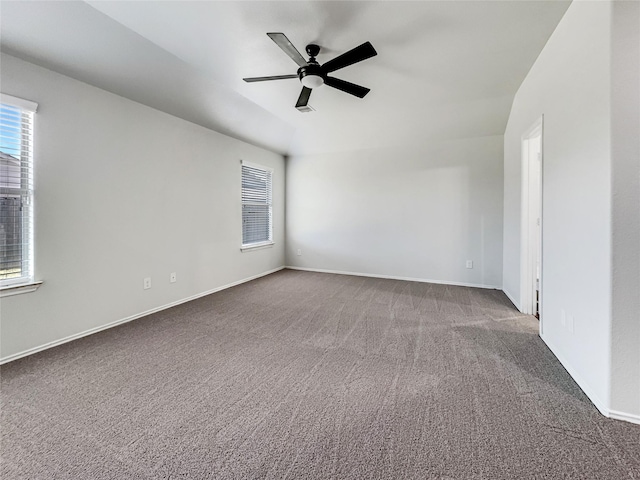 empty room with carpet flooring and ceiling fan