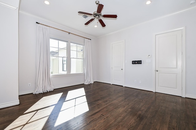 unfurnished room with crown molding, dark hardwood / wood-style floors, and ceiling fan