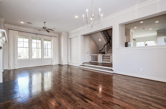 unfurnished living room with crown molding, dark hardwood / wood-style floors, and ceiling fan with notable chandelier