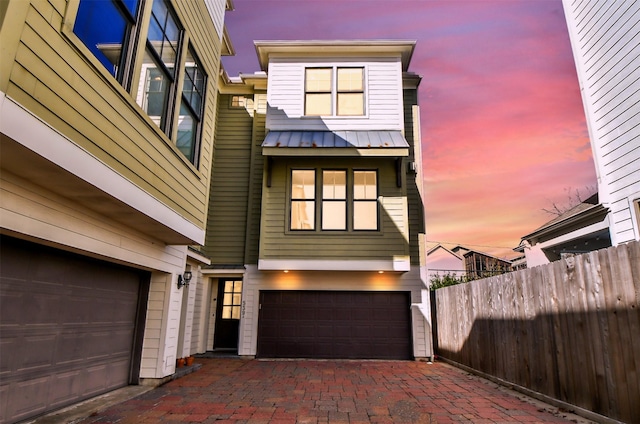 view of front of property featuring a garage