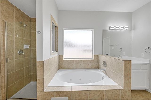 bathroom featuring plus walk in shower