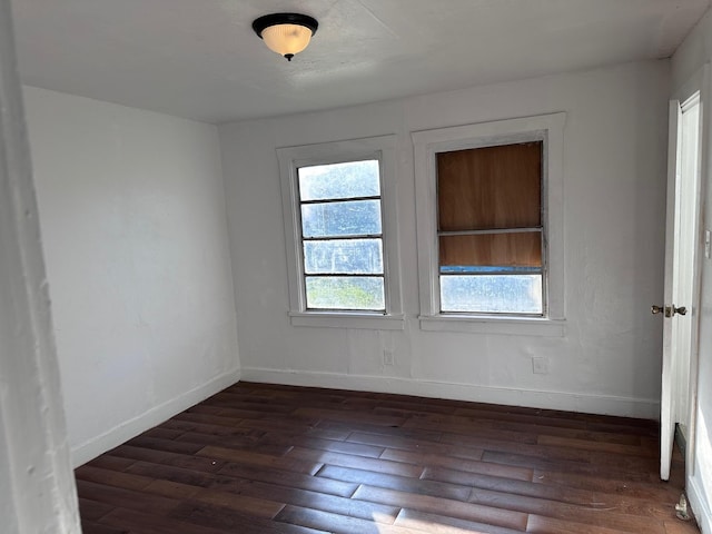 1006 9th St, Galena Park, TX 77547 - unfurnished room with dark hardwood / wood-style flooring