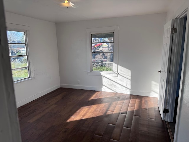 1006 9th St, Galena Park, TX 77547 - unfurnished room featuring dark hardwood / wood-style floors