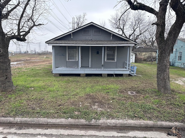 1006 9th St, Galena Park, TX 77547 - bungalow-style house with a porch and a front yard