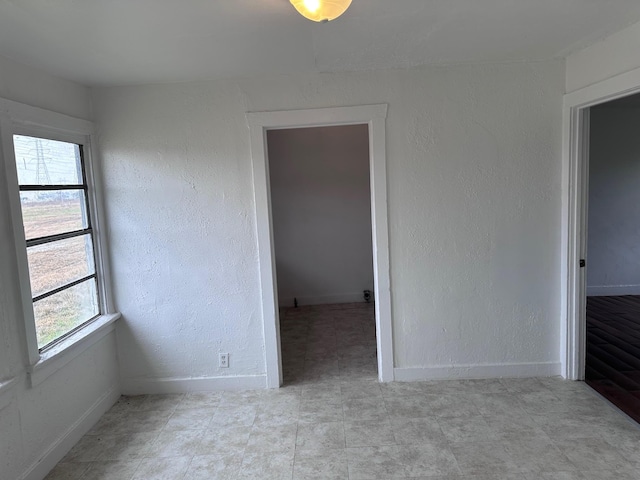 1006 9th St, Galena Park, TX 77547 - spare room with a wealth of natural light