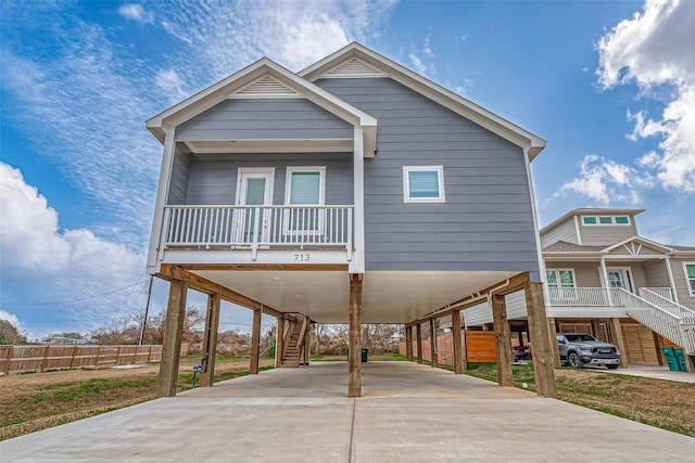 view of front of home featuring a carport