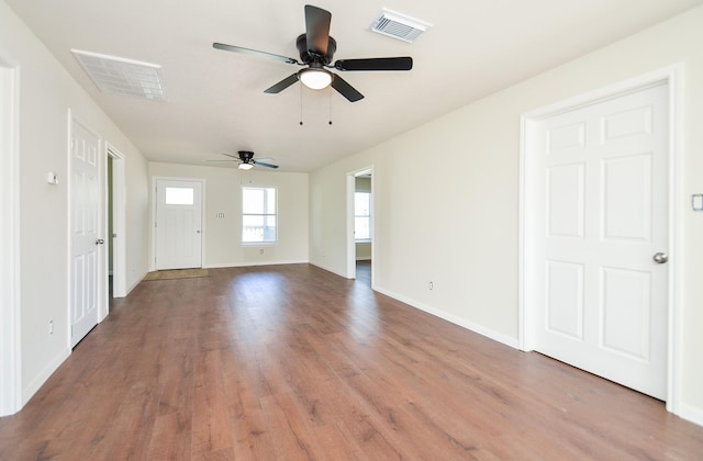 interior space featuring hardwood / wood-style floors and ceiling fan