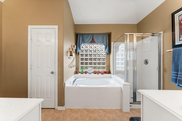 bathroom with vanity, plus walk in shower, and tile patterned flooring