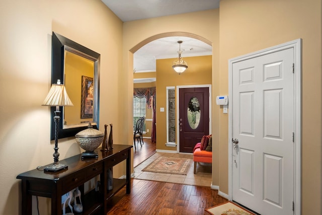 entryway with dark wood-type flooring