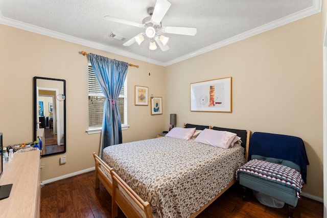 bedroom featuring ceiling fan, ornamental molding, and dark hardwood / wood-style flooring