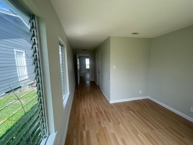 hall featuring light hardwood / wood-style floors