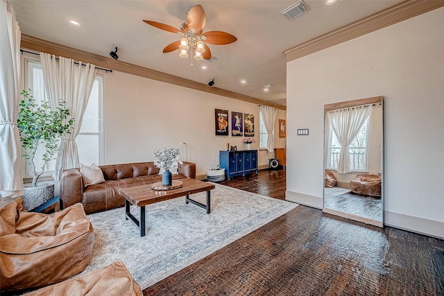 living room featuring dark wood-type flooring, ceiling fan, and ornamental molding