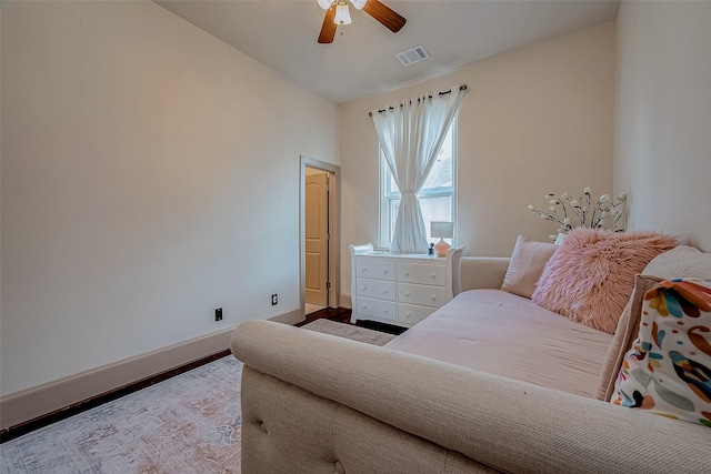 bedroom featuring hardwood / wood-style floors and ceiling fan