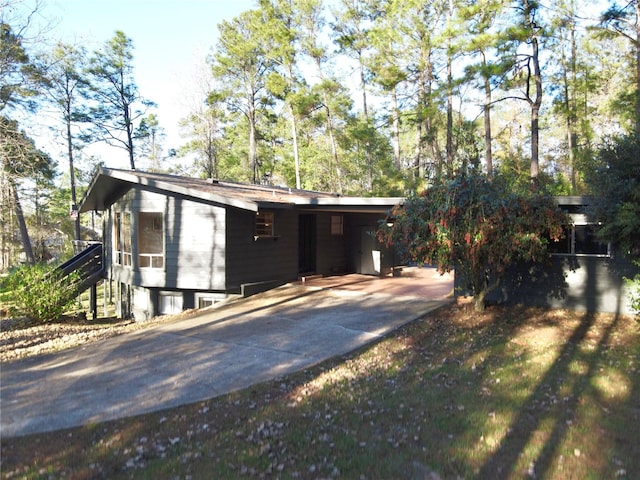 exterior space featuring a carport