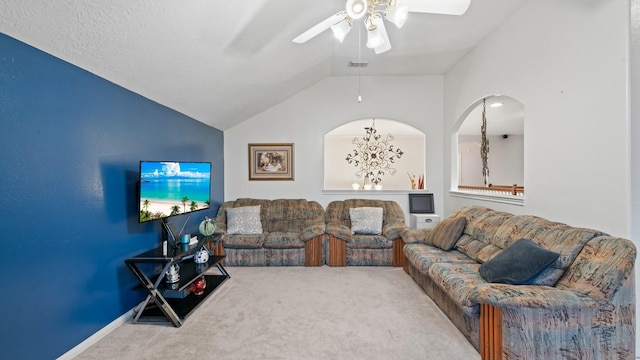 living room featuring lofted ceiling, carpet flooring, and ceiling fan