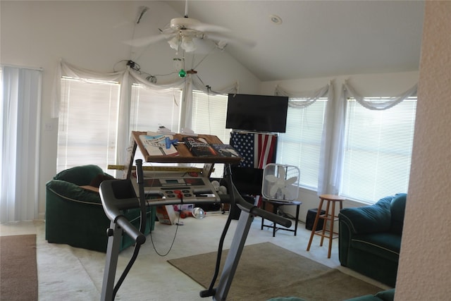 exercise area with light carpet and ceiling fan