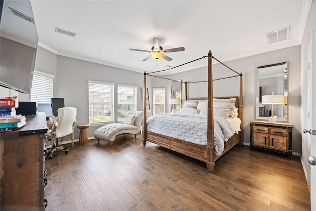 bedroom with ornamental molding, ceiling fan, and dark hardwood / wood-style flooring