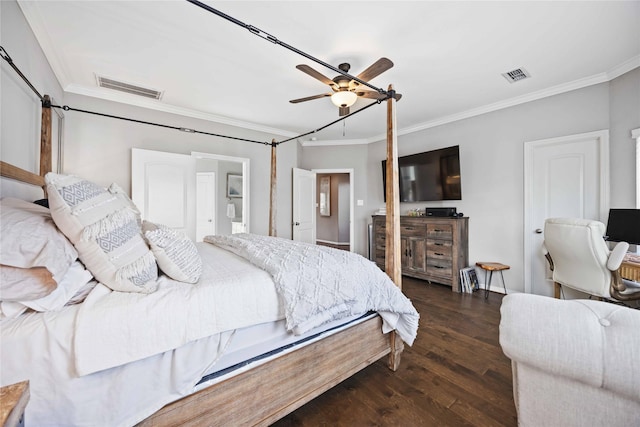 bedroom featuring ornamental molding, ceiling fan, and dark hardwood / wood-style flooring