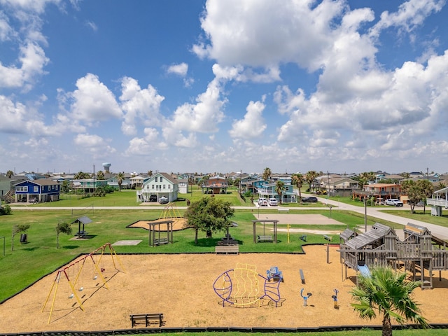 view of home's community with a lawn