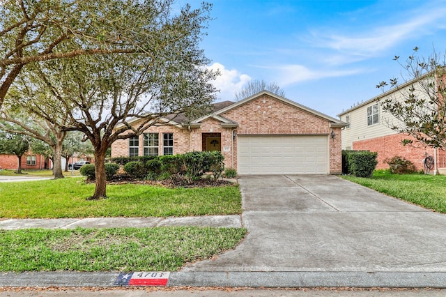 ranch-style home featuring a garage, driveway, brick siding, and a front lawn