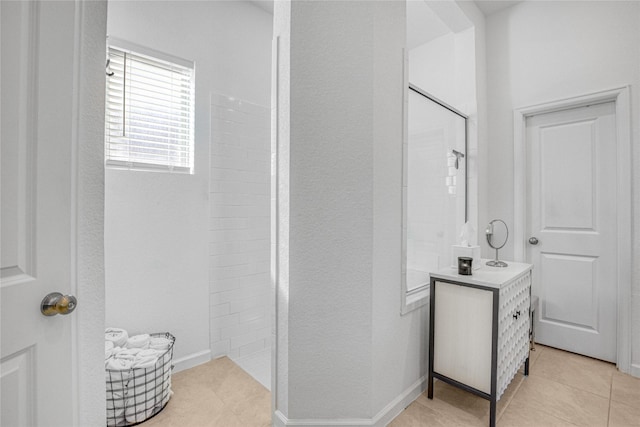 bathroom featuring a shower and tile patterned floors