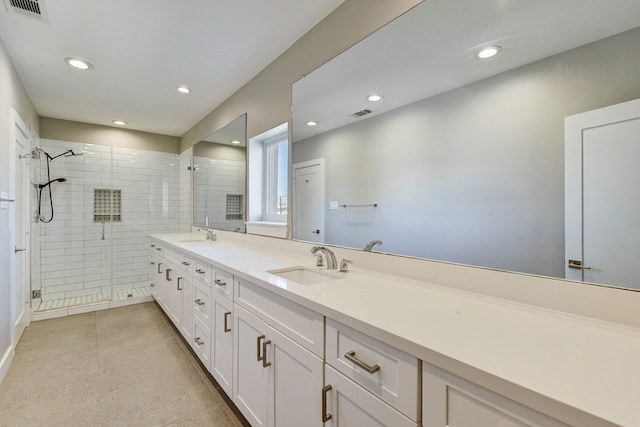 bathroom featuring vanity and walk in shower