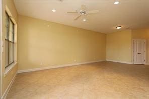 empty room featuring ceiling fan